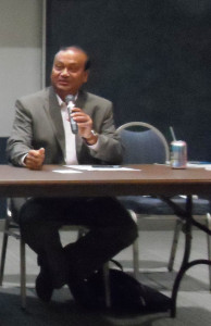 Mansur Hasib speaks during a panel discussion.